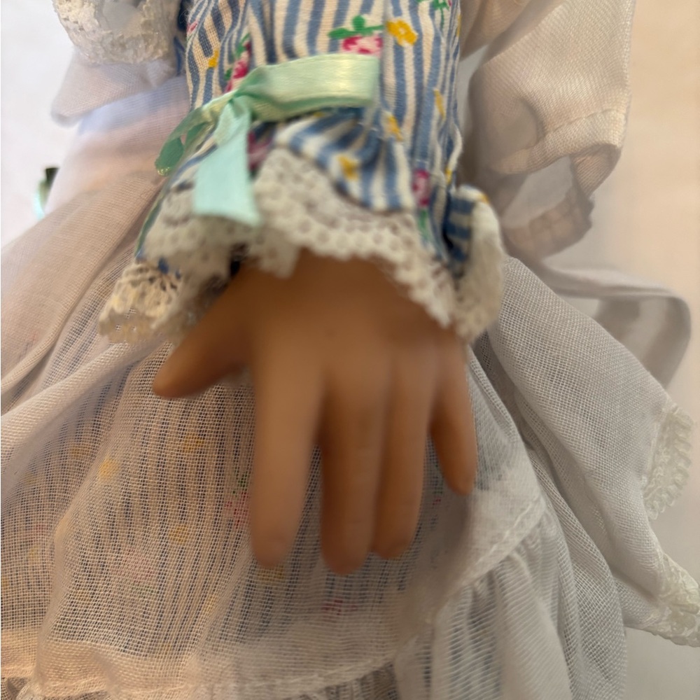 Charming Blue and White Porcelain Doll with Curly Hair - Picture 8 of 11